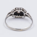 Bague ancienne en or blanc 18 carats avec diamant central (0,20 ct) et rosettes, années 1940