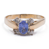 Anello vintage in oro 14K con tanzanite centrale e diamanti, anni ‘70