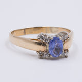 Anello vintage in oro 14K con tanzanite centrale e diamanti, anni ‘70