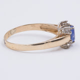 Anello vintage in oro 14K con tanzanite centrale e diamanti, anni ‘70