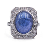 Bague en or blanc 18 carats avec tanzanite cabochon (7 ct) et diamants (0,45 ct)