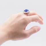 Bague en or blanc 18 carats avec tanzanite cabochon (7 ct) et diamants (0,45 ct)