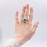 Anello a ballerina in oro 18k con smeraldo colombiano di circa 3.60ct e 80 diamanti di 2.24ct totali