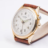 Orologio svegliarino Vulcain Cricket laminato, anni '50