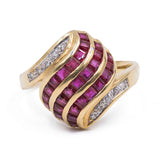 VINTAGE RING IN 18K GOLD WITH RUBIES (1.50CTW CA.) AND DIAMONDS (0.20CTW CA.), 1970s