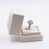 Anello a ballerina in oro 18k con smeraldo colombiano di circa 3.60ct e 80 diamanti di 2.24ct totali