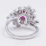Anello in oro bianco 18k con rubino centrale (1ct) e diamanti taglio brillante (1.46ct)