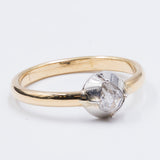 Bague ancienne en or 18 carats et argent avec un diamant taille rosette