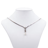 Collier vintage in oro bianco 14kt con 3 diamanti (0.15ct) e perla , anni 80