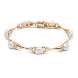 BRACCIALE VINTAGE IN ORO 14K CON PERLE, ANNI '70