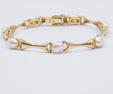 BRACCIALE VINTAGE IN ORO 14K CON PERLE, ANNI '70