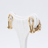 Orecchini vintage in oro giallo 18k con rosette e zaffiri, anni '50/'60