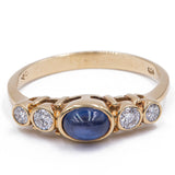Anello vintage in oro giallo 14kt con zaffiro cabochon e diamanti (0.24ctw), anni '70