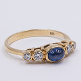 Anello vintage in oro giallo 14kt con zaffiro cabochon e diamanti (0.24ctw), anni '70