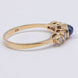 Anello vintage in oro giallo 14kt con zaffiro cabochon e diamanti (0.24ctw), anni '70