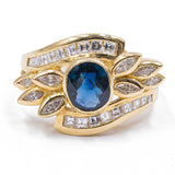Anello vintage in oro giallo 18k con zaffiro centrale (1.2ct) e diamanti (1.5ct), anni '70