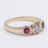 Anello vintage in oro 14K con diamante centrale, zaffiro e rubino, anni '60/'70