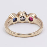 Anello vintage in oro 14K con diamante centrale, zaffiro e rubino, anni '60/'70
