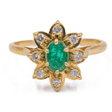Anello vintage a margherita in oro 18K con smeraldo e diamanti (0.24ctw ca.), anni '70