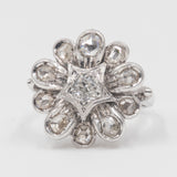 Bague vintage en or blanc 18 carats avec diamant central et rosaces, 1960