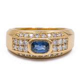 Anello vintage in oro giallo 18K con topazio blu e diamanti (0.56ctw ca.), anni '70/'80