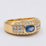 Anello vintage in oro giallo 18K con topazio blu e diamanti (0.56ctw ca.), anni '70/'80