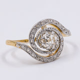 Anello "Tourbillon" in oro giallo 18K e platino con diamante centrale (0.40ct ca.) e rosette laterali, anni '20