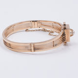 BRACCIALE RIGIDO ANTICO IN ORO 14K CON PERLA CENTRALE, FINE '800