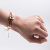 BRACCIALE RIGIDO ANTICO IN ORO 14K CON PERLA CENTRALE, FINE '800
