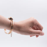 BRACCIALE RIGIDO ANTICO IN ORO 14K CON PERLA CENTRALE, FINE '800