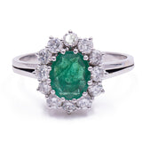 Bague marguerite en or 18 ct avec émeraude (2,20 ct) et diamants (1 ct), années 1960