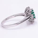 Bague marguerite en or 18 ct avec émeraude (2,20 ct) et diamants (1 ct), années 1960