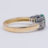Anello vintage in oro 18k con smeraldo centrale e diamanti taglio vecchio (0.50ct), anni '40