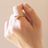 Anello vintage in oro 18K con diamante (0.03ct ca.) e rubini, anni ‘70