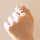 Anello vintage in oro 18K con diamante (0.03ct ca.) e rubini, anni ‘70