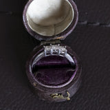 14K white gold modern ring with princess cut diamonds (0.24ctw approx.)