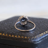 Bague marguerite vintage en or blanc 14 carats avec saphir (env. 0,60 ct) et diamants (env. 0,16 ct), années 1960