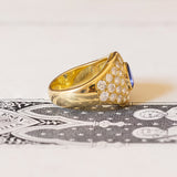Vintage 18K gold ring with sapphire (approx.1ct) and diamonds (approx.1.50ctw), 1960s / 1970s