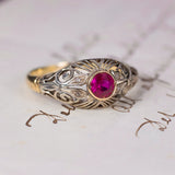 Anello Art Nouveau in oro 18K e argento, con rubino e rosette di diamante, anni '20 - Antichità Galliera