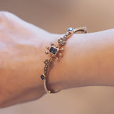 Bracciale rigido antico in oro 12K con zaffiri e diamanti, primi del '900