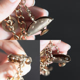 Bracciale antico con charms, primi del '900