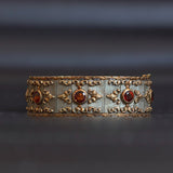 Bracciale semirigido in oro 18K con quarzi citrini, anni '50