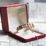 Bracciale rigido antico in oro 14K con perla centrale, fine '800