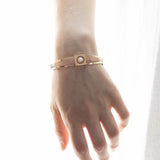 Bracciale rigido antico in oro 14K con perla centrale, fine '800