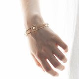 Bracciale rigido antico in oro 14K con perla centrale, fine '800