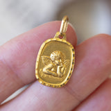 Vintage pendant in 18K gold representing Putto, 70s / 80s