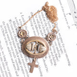 Collana antica in oro 18K e 9K con smalti neri, seconda metà dell'800