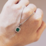 Collier vintage in oro bianco 18K con smeraldo (0.89ct ca.) e diamanti (0.16ctw ca.), anni '70/'80
