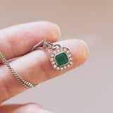 Collier vintage in oro bianco 18K con smeraldo (0.89ct ca.) e diamanti (0.16ctw ca.), anni '70/'80