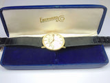 Orologio da polso in oro Eberhard automatico con datario. Anno 1975 . Con scatola e garanzia - Antichità Galliera